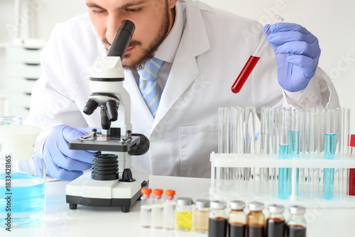 Male scientist with blood s...