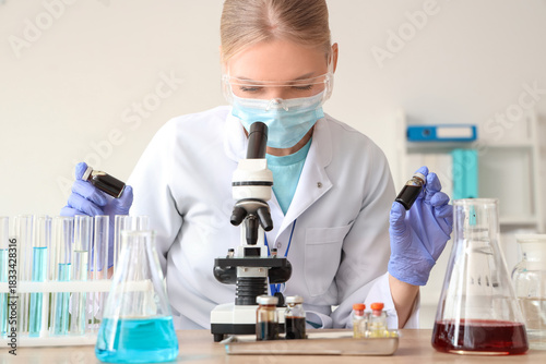 Female scientist with medic...