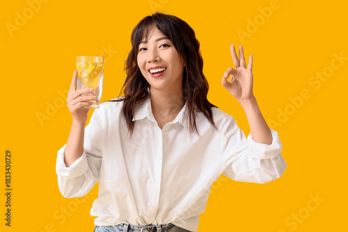 Young Asian woman with citr...