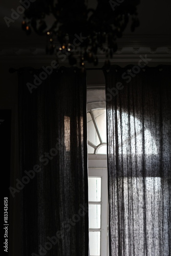 Beautiful view from retro window. Light from window to the dark room.