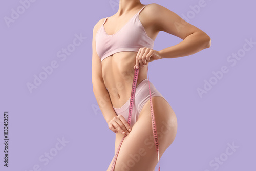 Young woman in underwear wi...