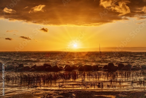 Fototapeta Naklejka Na Ścianę i Meble -  
Sunset on the steep coast at the beach of the Baltic Sea on the island of Poel