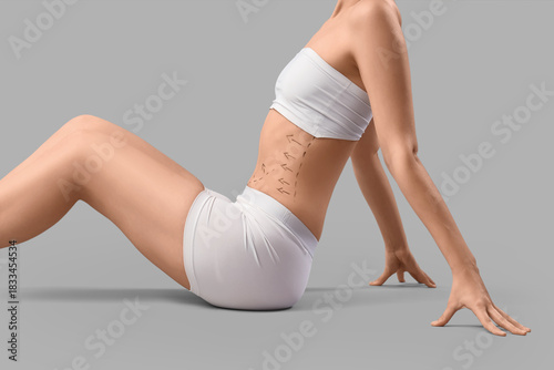 Young woman in underwear wi...