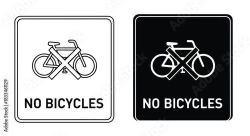 Two identical 'No Bicycles' signs, one in black and white, the other in white and black, both featuring a crossed-out bicycle icon.