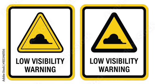 Two identical low visibility warning signs featuring a yellow triangle with a fog icon and text below.