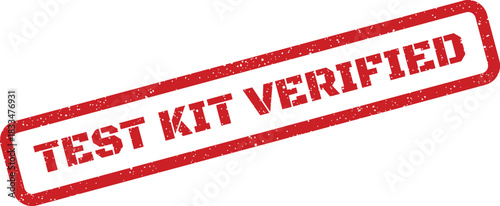 Distressed rubber stamp displays TEST KIT VERIFIED text, angled for official confirmation approval