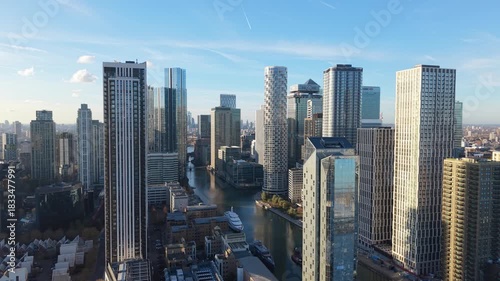 Aerial View of Modern Buildings and Waterway in Canary Wharf, London