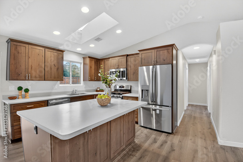 Elegant Cooking Space, Sophisticated Kitchen Emphasizing Modern Appliances And Open Plan Layout