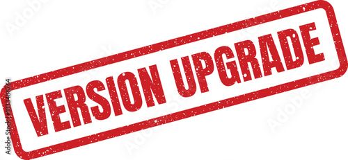 This illustration features a strong red textured rubber stamp displaying the words VERSION UPGRADE, suggesting a major system enhancement