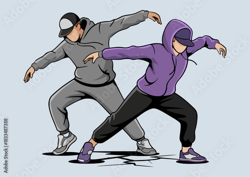 Stylish Dance Poses of Two Urban Dancers in Hoodies and Sneakers