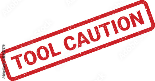 Worn rubber stamp featuring the important warning TOOL CAUTION within a rectangular border, conveying an alert message