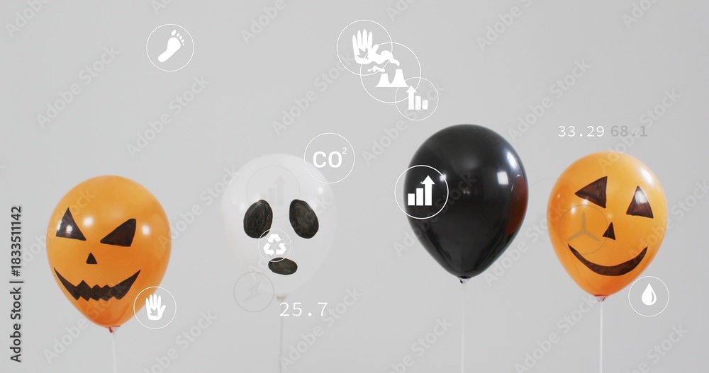 Naklejka premium Displaying 4 balloons: 2 jack-o'-lanterns, 1 skull, 1 black on white sticks in studio, infographics