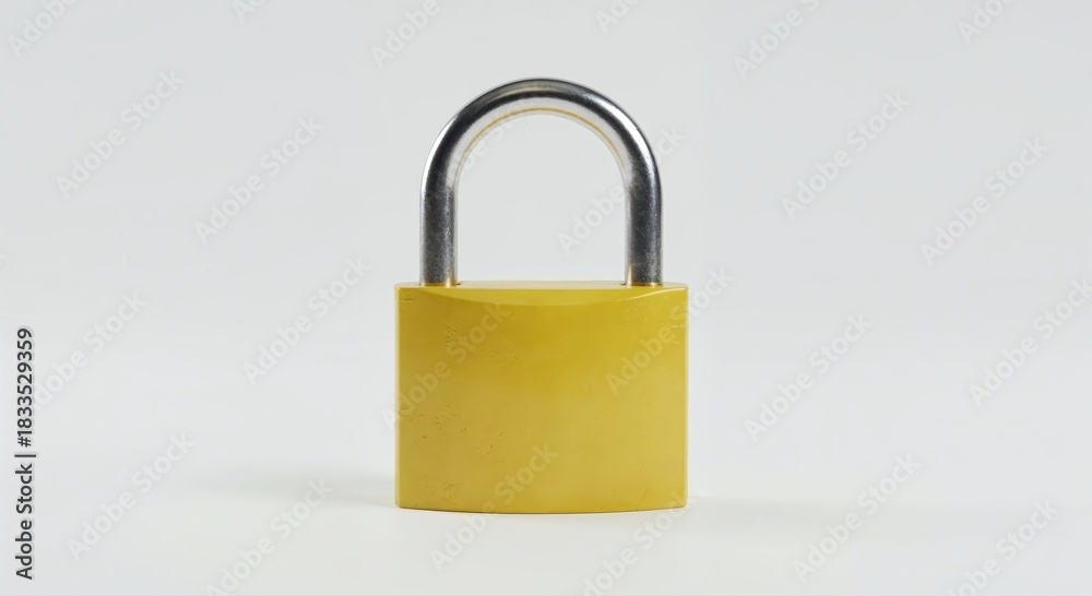 Fototapeta premium Secure Yellow Lock: An image of a yellow padlock, signifying protection, security, and the concept of access control.