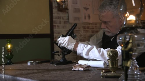 1901 Man using a tilt microscope