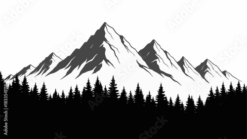 Majestic mountain range towering above a dense forest silhouette in monochrome.