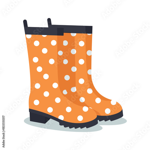 A pair of orange rain boots with white dots