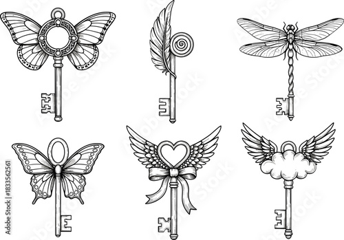 Six ornate black and white antique keys with decorative tops vintage