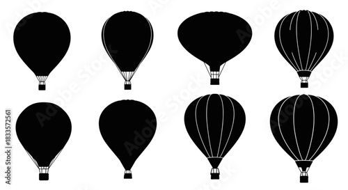 Collection of Eight Black Hot Air Balloon Silhouettes Various Shapes and Designs.