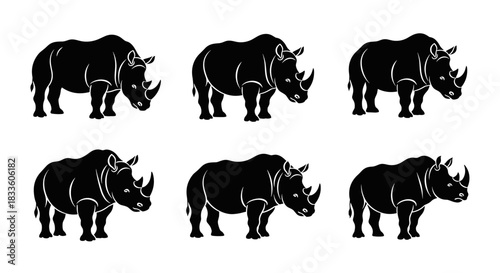 Set of Six Black Rhinoceros Silhouettes Facing Left.