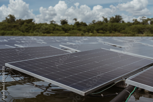 Professional workers clean and inspect solar panels on a floating buoy. Power plant with water.(PHOTO)
