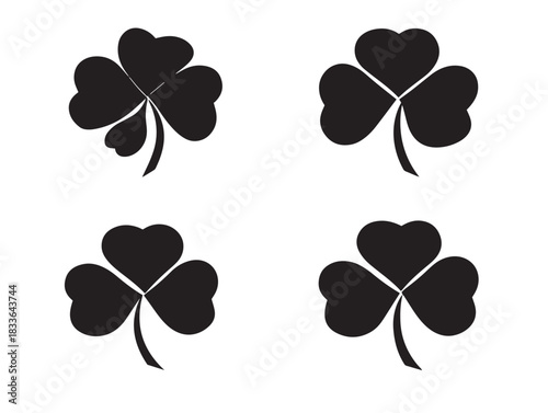 A stunning collection of four beautiful shamrock silhouette designs