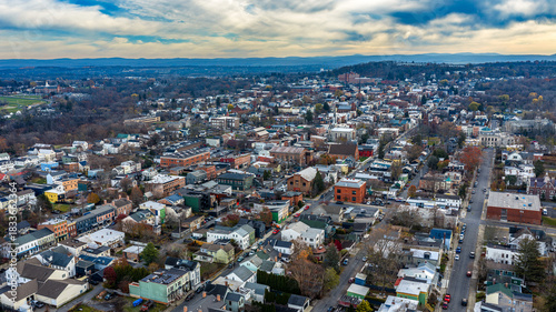 Fototapeta Naklejka Na Ścianę i Meble -  Hudson, NY, USA - November 20, 2025: Aerial view of Hudson, New York along the Hudson River.  