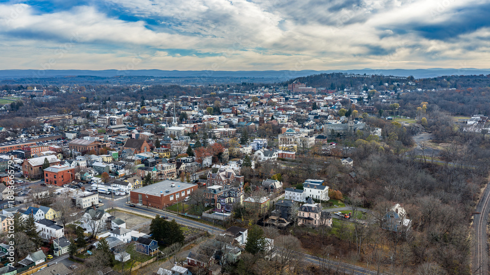 Obraz premium Hudson, NY, USA - November 20, 2025: Aerial view of Hudson, New York along the Hudson River. 