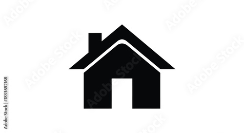 A simple black house shape stands out against a white background a striking silhouette