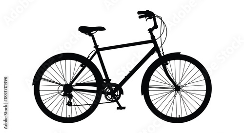 A sleek black bicycle stands prominently displayed a captivating dark silhouette