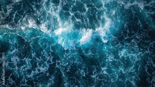 Abstract turquoise blue ocean water surface with light reflections