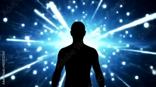 Silhouette of a Person Standing in Front of a Light Burst.