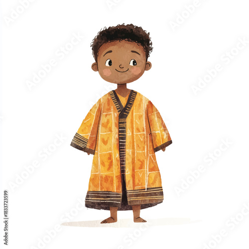 Smiling African boy wearing traditional yellow robe.