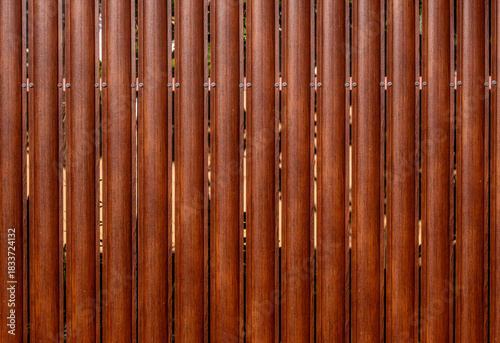 A fence made of planks in close-up.