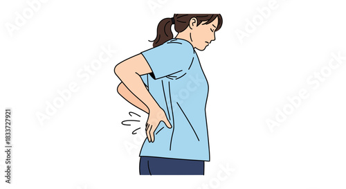 A woman is experiencing lower back pain, holding her hand to the affected area.