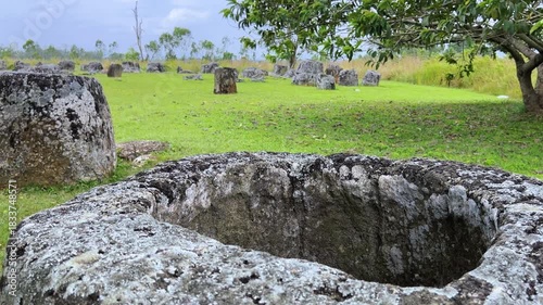 Valley of the Jars, Laos. Phongsavan. Valley of the Jars. The megalithic archaeological landscape consists of thousands of stone jars scattered across the Xiangkhouang Plateau. 4К
