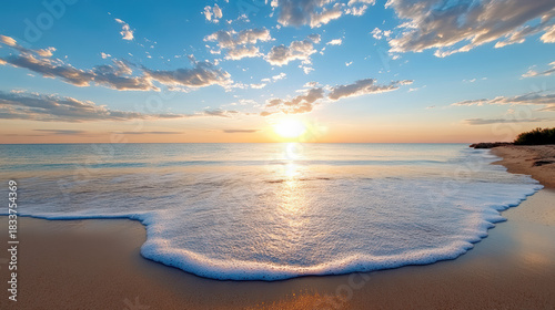 Fototapeta Naklejka Na Ścianę i Meble -  Sunrise beach sea calm sand horizon sun reflection peaceful