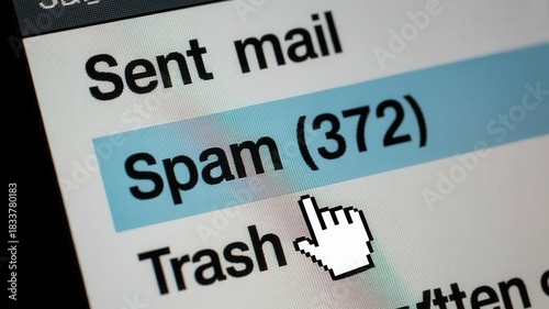 Digital interface displays an electronic mail folder containing numerous unsolicited messages.