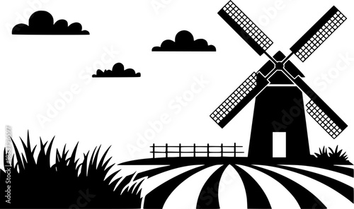 Black and White Silhouette of a Windmill in a Field with Clouds