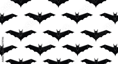Seamless pattern of spooky silhouetted bats flying across a ideal for halloween decorations and themed designs isolated on white background