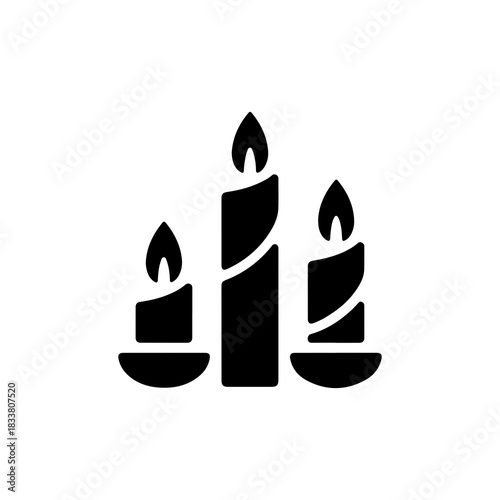 Three elegant candles burning brightly conveying peace with black fill