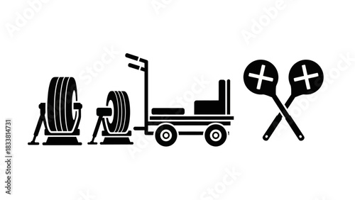 A collection of black silhouette icons depicting tire service equipment, a utility cart, and crossed signal paddles.