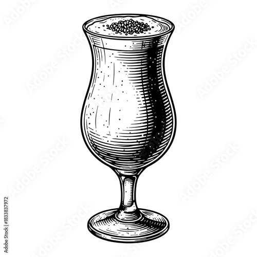 Painkiller cocktail in hurricane glass with frothy top