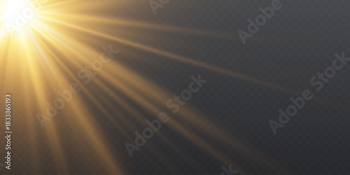 Golden light rays shining down on dark background