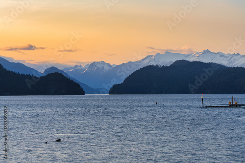 Harrison Lake sunset with snow capped mountains in British Columbia
