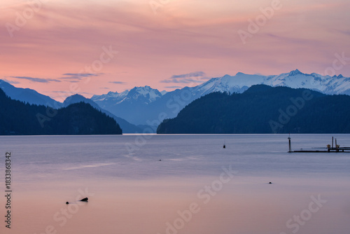 Harrison Lake sunset with snow capped mountains in British Columbia