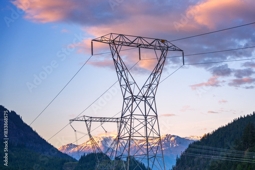 Wallpaper Mural Power lines and transmission towers spanning a valley with snow Torontodigital.ca