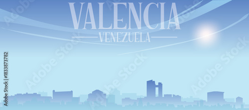 Blue panoramic poster of the city skyline with misty background buildings and clouds of VALENCIA, VENEZUELA