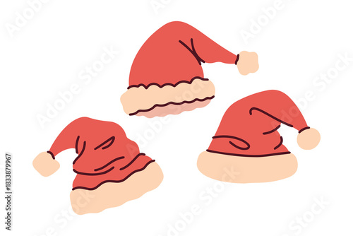 A group of three red winter hats with fluffy pompons. Traditional Santa Claus headwear elements for New Year greeting cards.