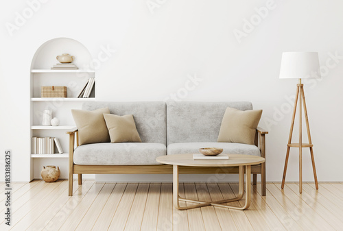 Modern living room with gray sofa, arched built-in niche with decorated shelves, coffee table and floor lamp. Cozy and comfortable home design. White interior wall background. 3D render.