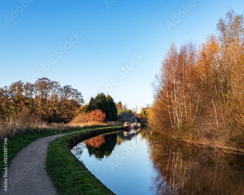 Moored narrow boats in the countryside